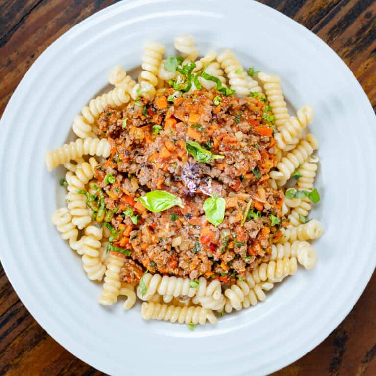 Venison ragu recipe in a white bowl