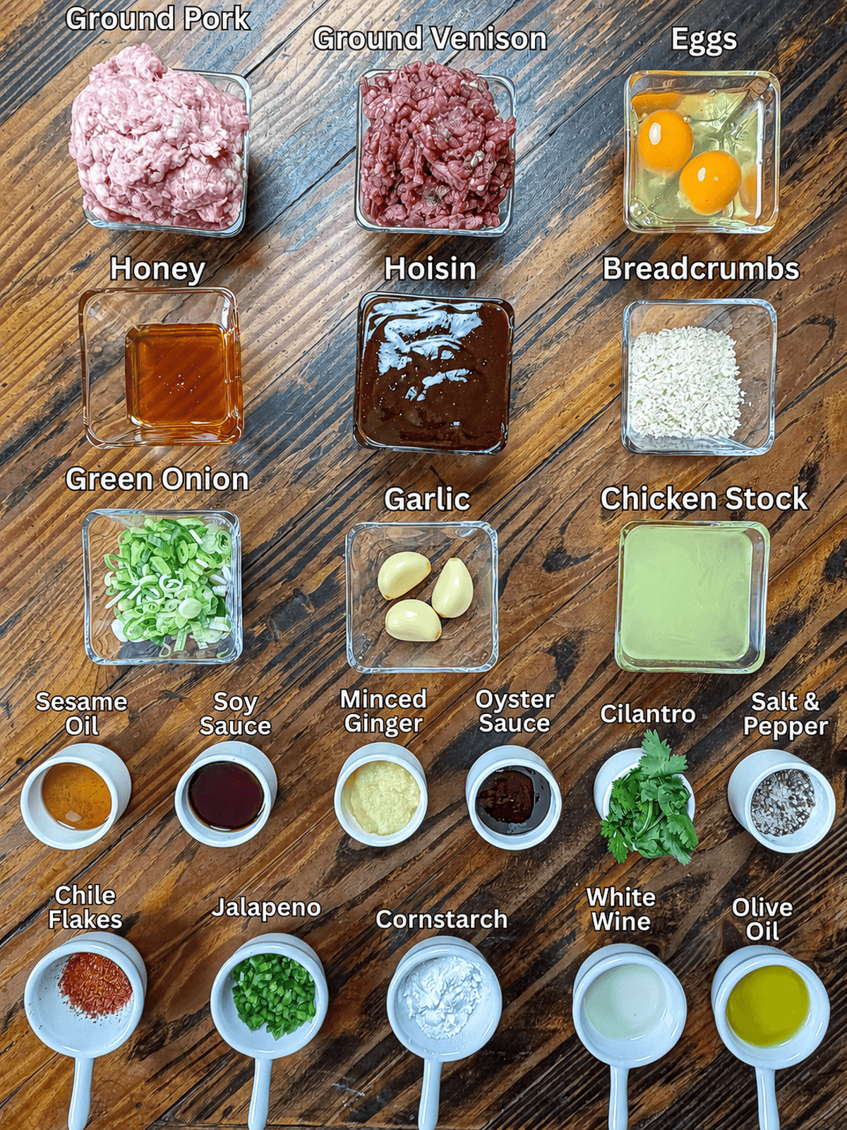 Venison meatball ingredients on a wooden table.