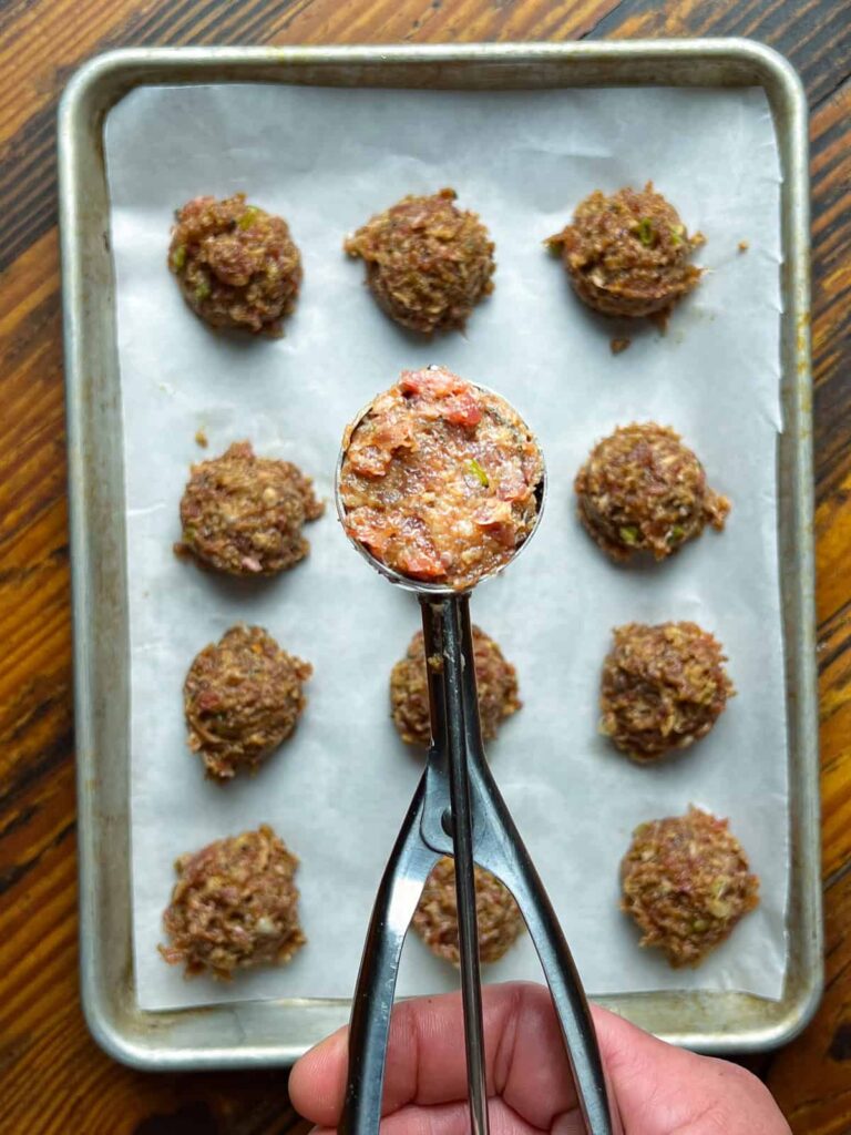 scooping deer meatballs