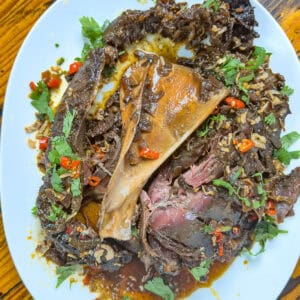 Slow cooker Venison roast on a white plate