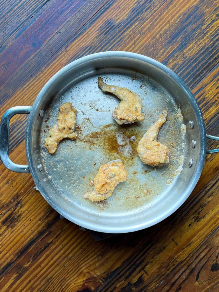 Squirrel browned in a pan.