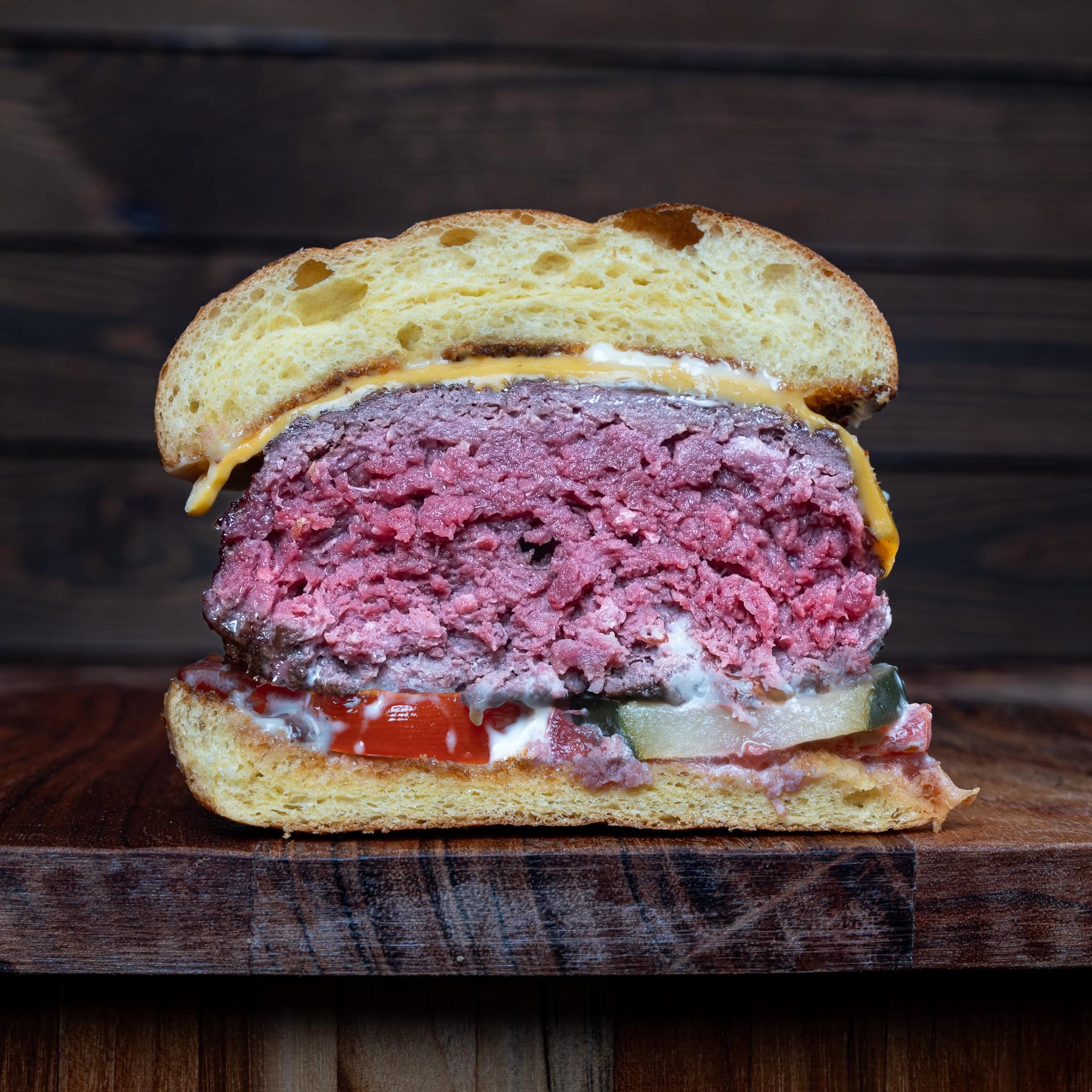 venison burger on a cutting board