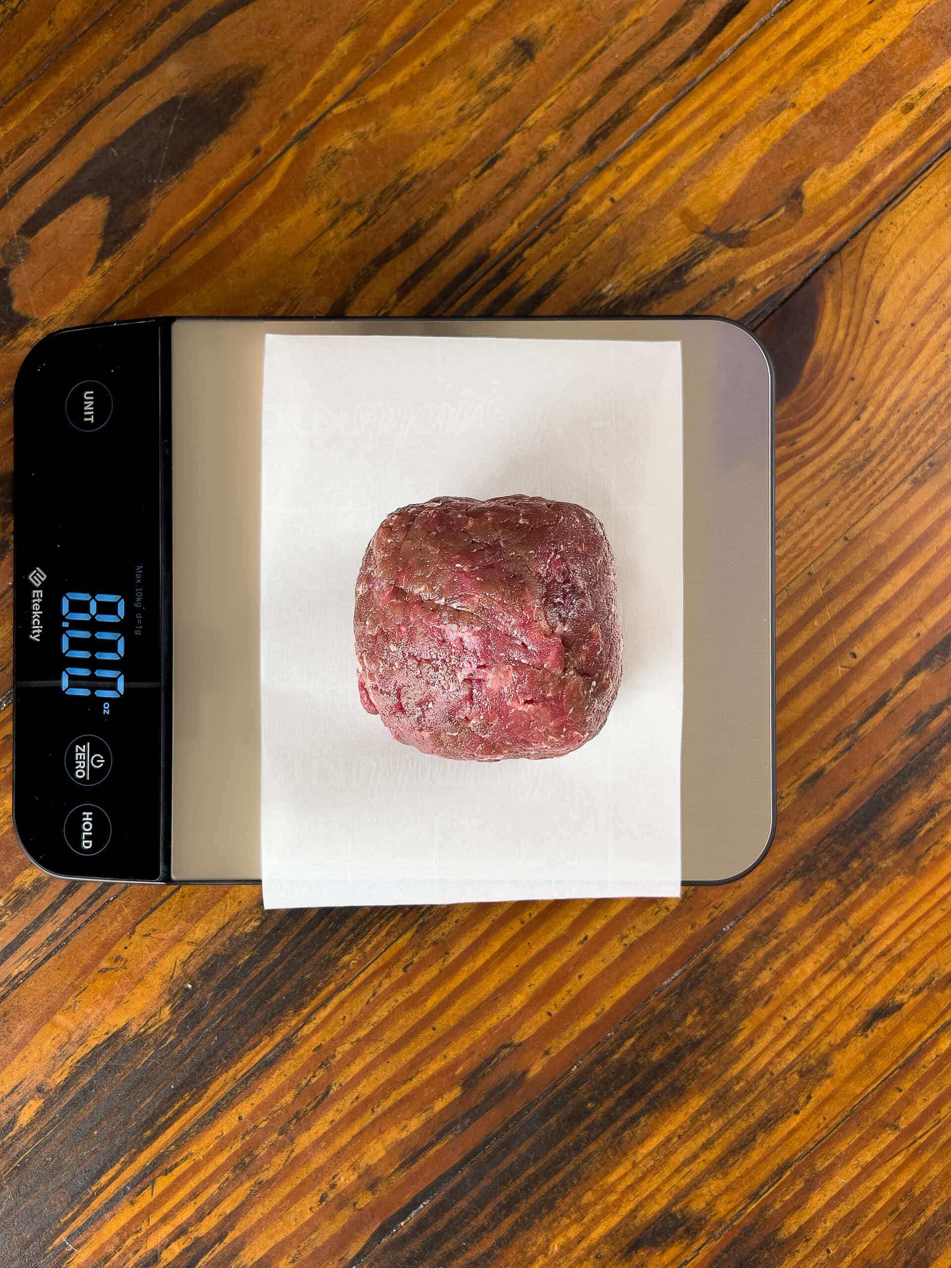 venison burger on scale
