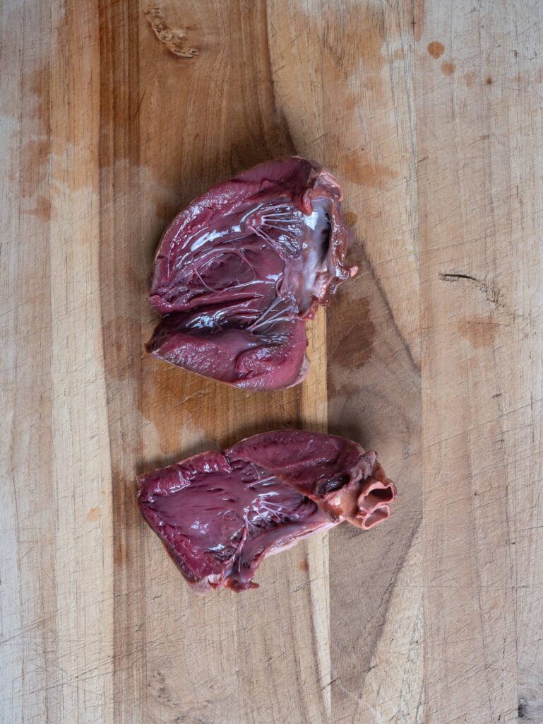 Exposing the connective tissue of a deers heart