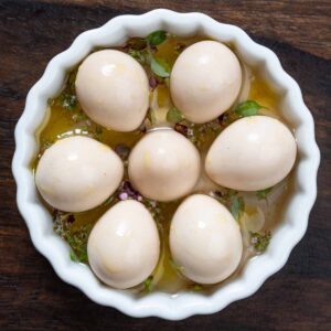 cajun pickled quail eggs in bowl
