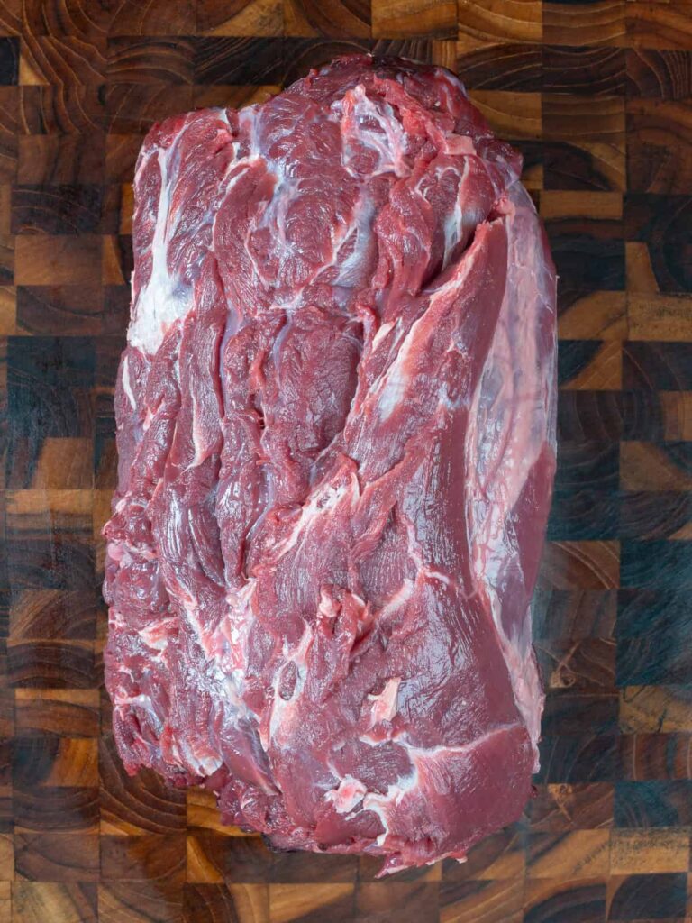 Rolled boneless neck prepped for trussing.
