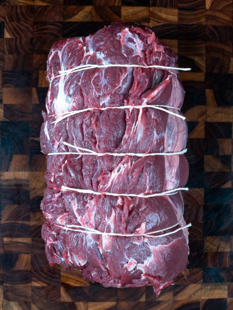 venison neck tied with butchers twine.