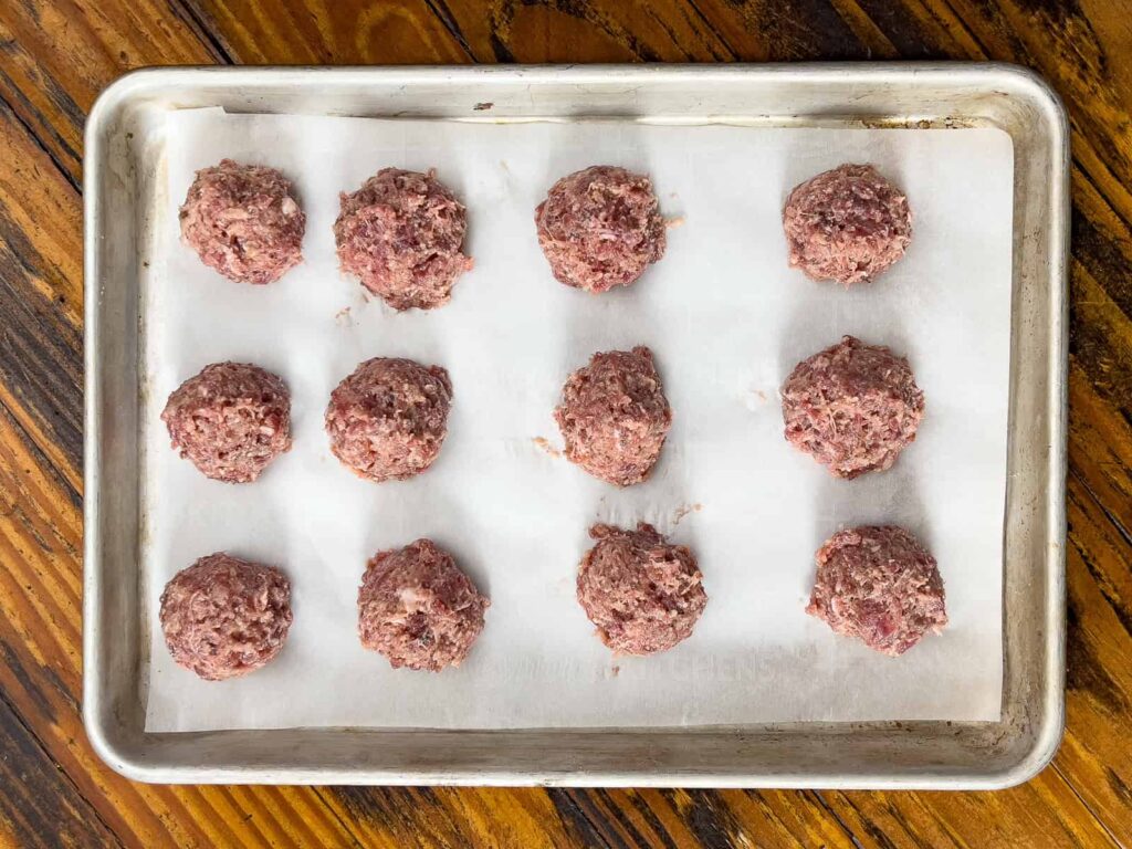 meatballs on parchment paper.