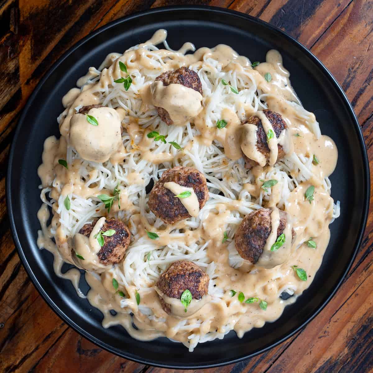 venison Swedish meatballs plated with pasta.