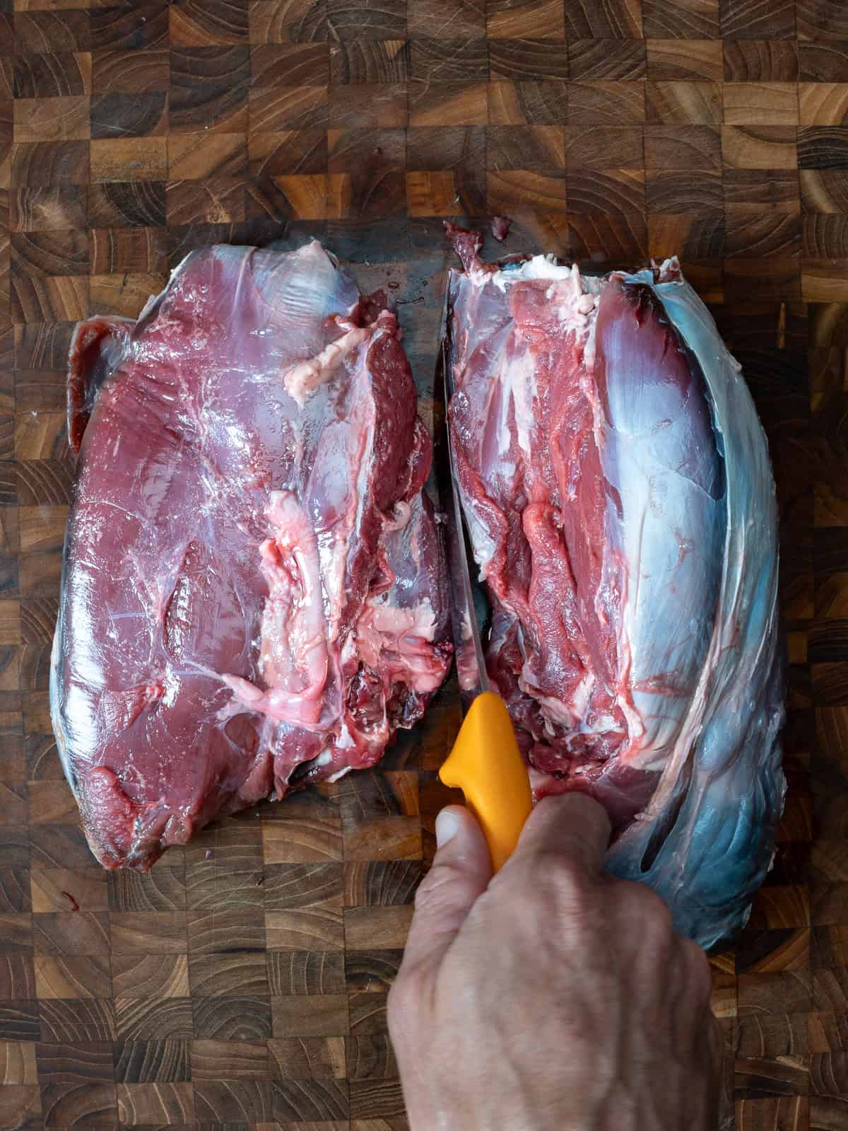 seperating the venison top round from sirloin tip.arating the venison top round from the