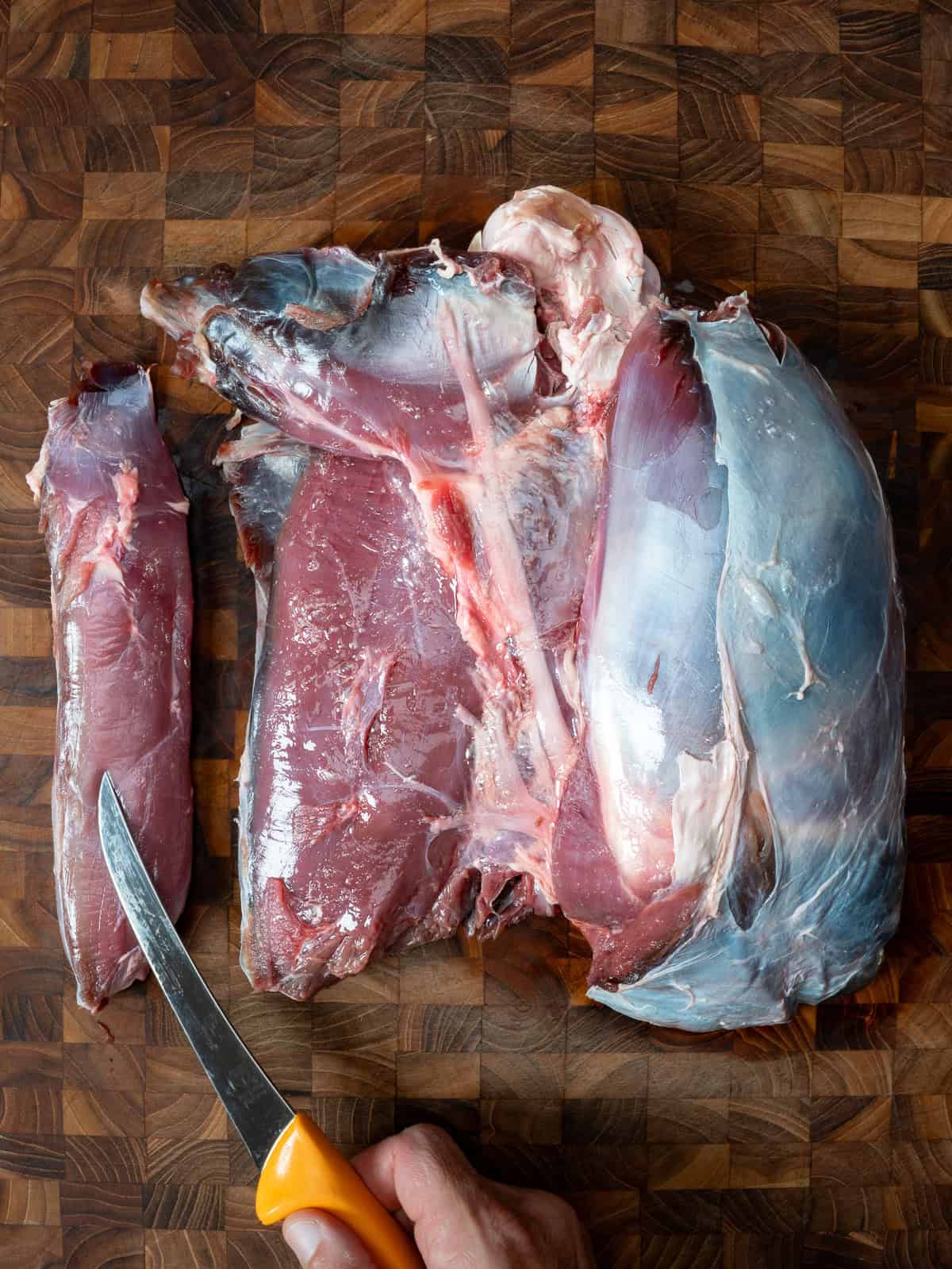 removing the venison eye of round.