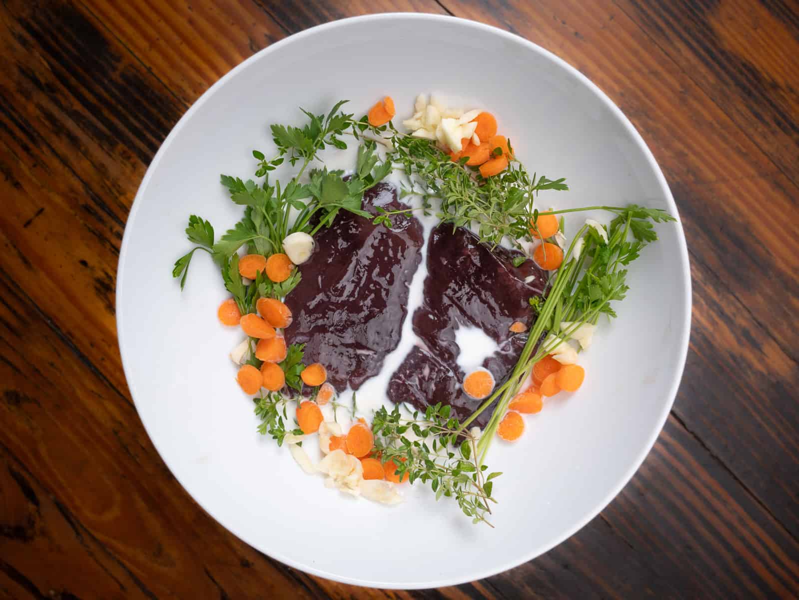 Deer liver soaking in milk and herbs.