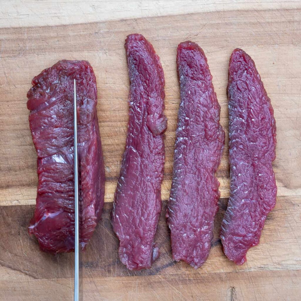 venison round prepped for jerky