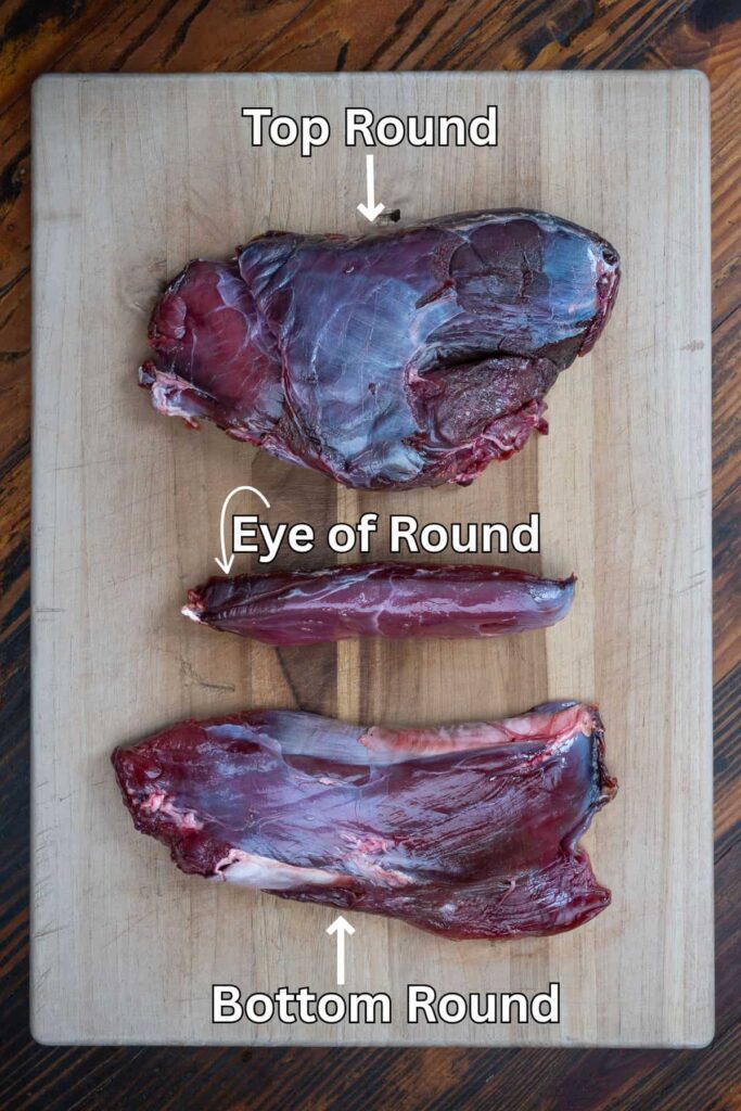 venison round steaks on cuttingboard