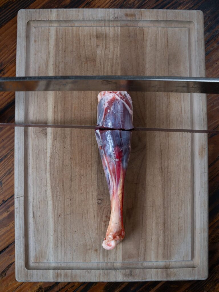 Venison shank cut with a saw.