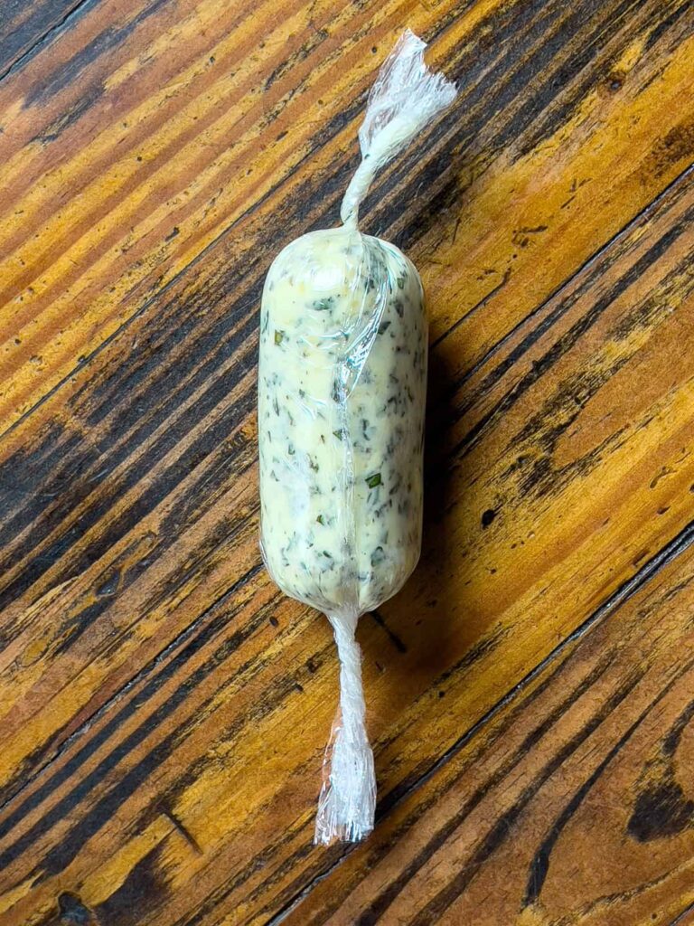 compound butter rolled in plastic wrap.
