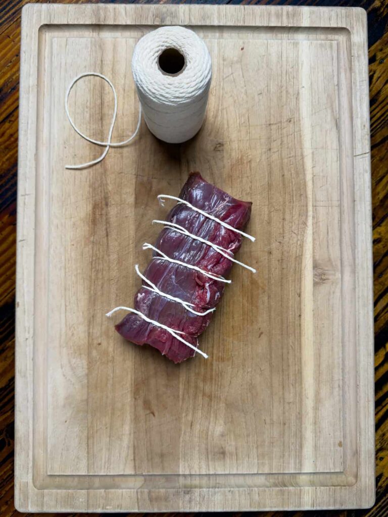 venison tied with butchers twine.
