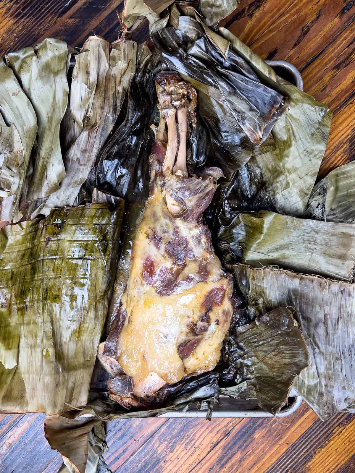 Cooked Kalua Pork in banana leaves.