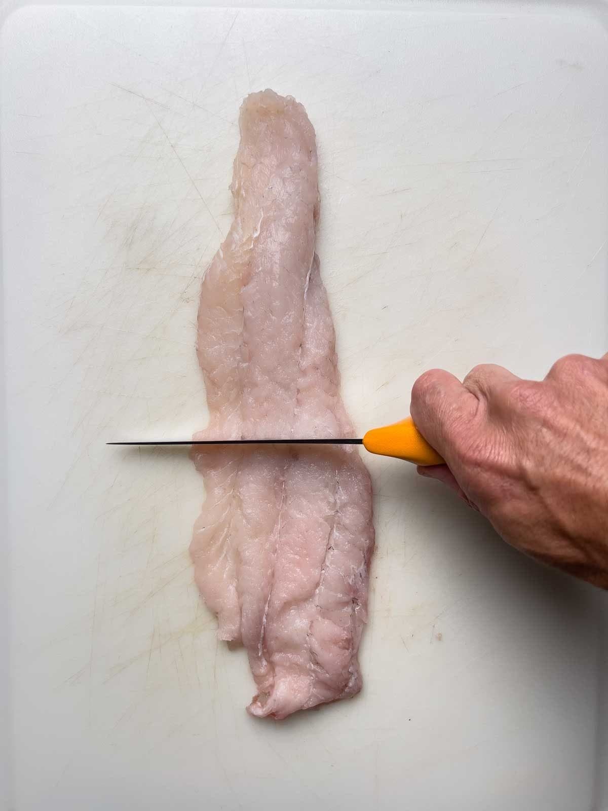 catfish on cutting board