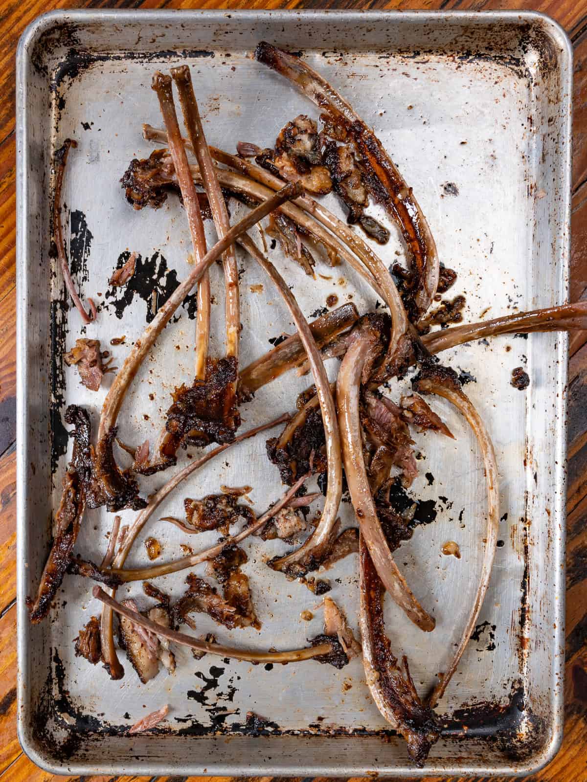 Eaten wild boar ribs on a pan.