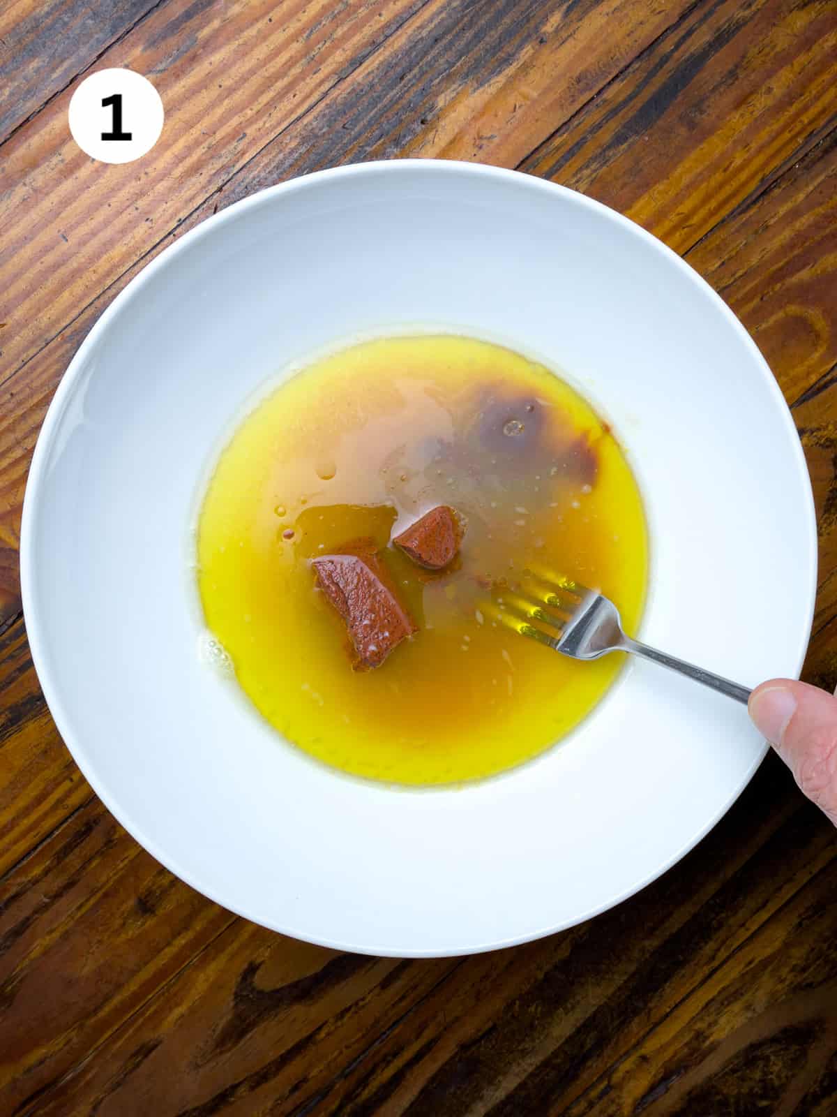Citrus shrimp marinade in a white bowl.