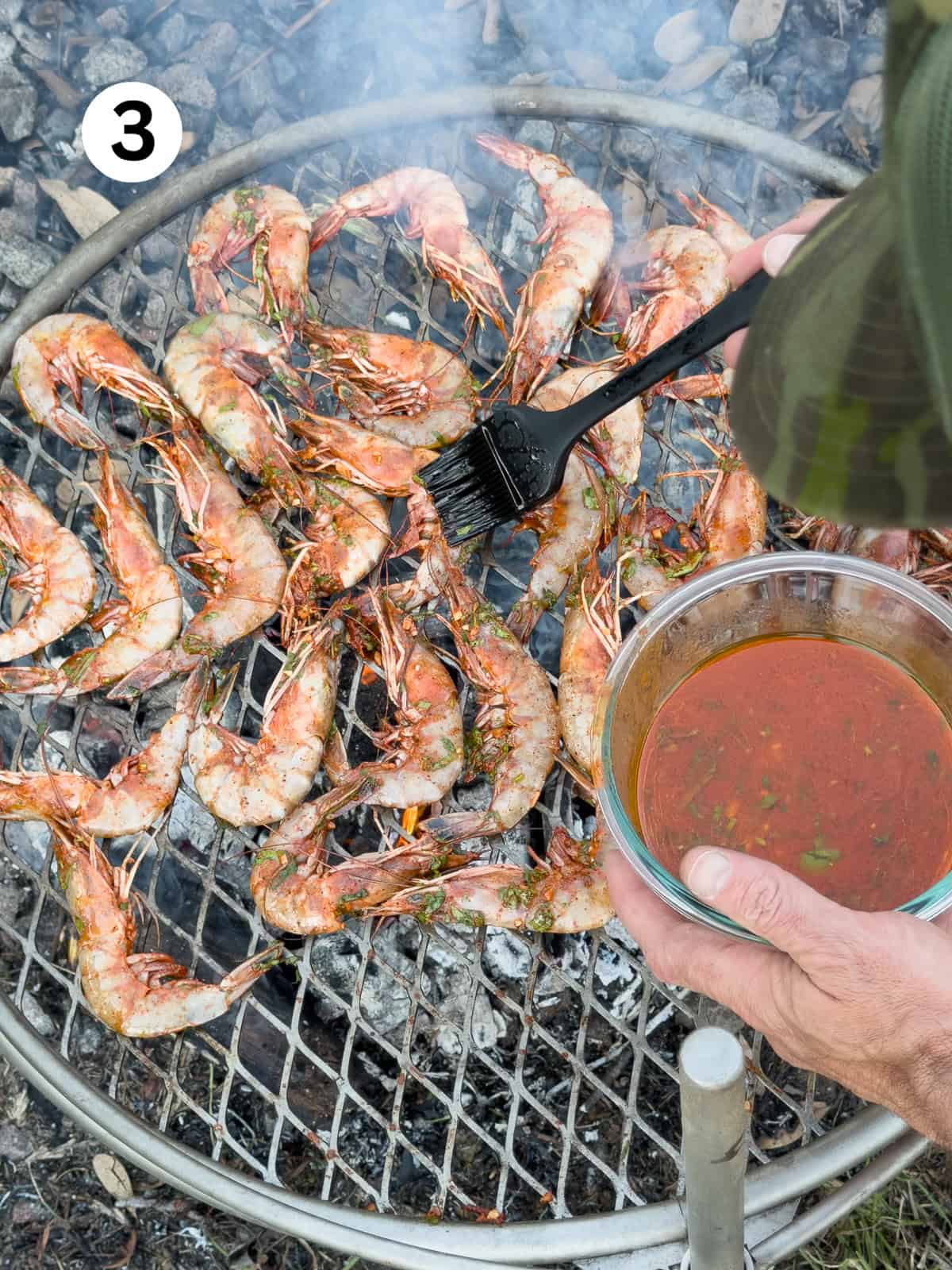 Thai-Fish-Sauce-Dressing Grilling and basting shrimp with a marinade over coals.