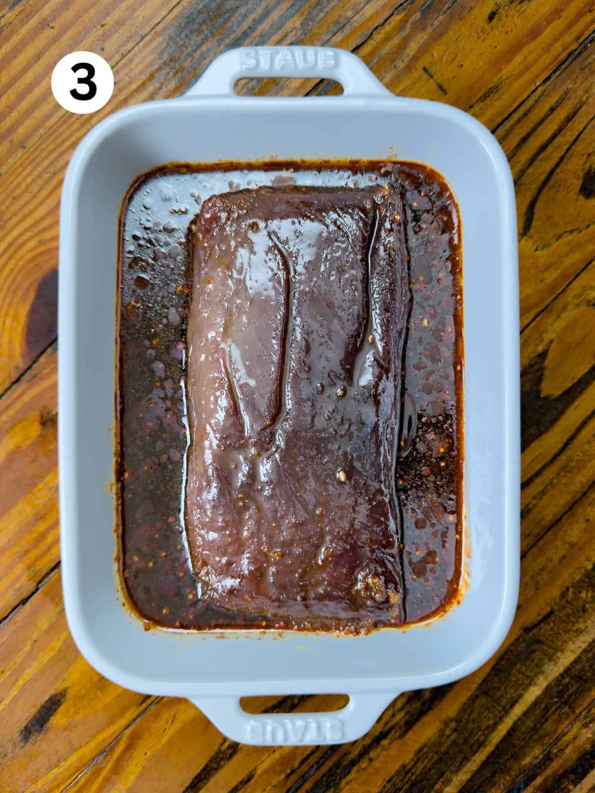 Thai-Fish-Sauce-Dressing Steak marinating in a Thai steak marinade.